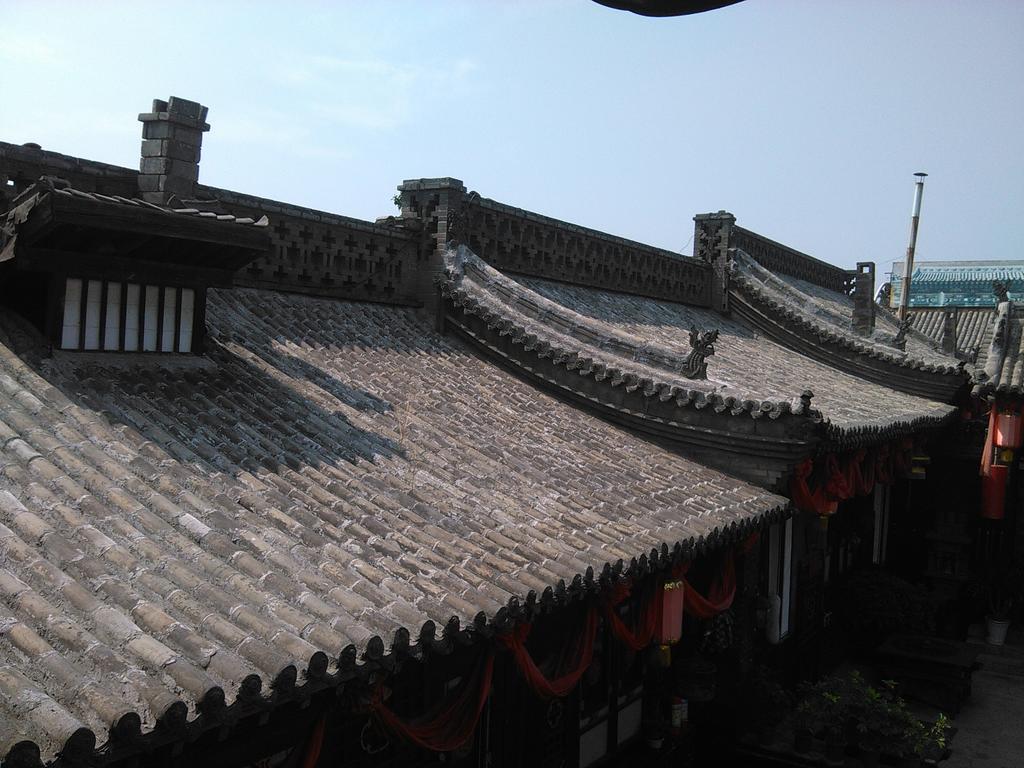 Pingyao Yucheng Yuan Inn Номер фото